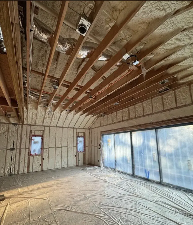 Interior walls and ceiling insulated with spray foam during new construction in Wildewood